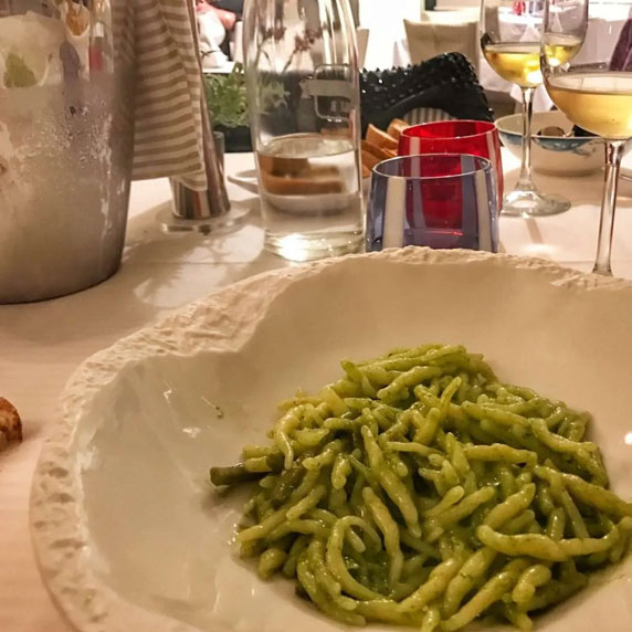 Romantic table with pesto and wine in Porto Venere